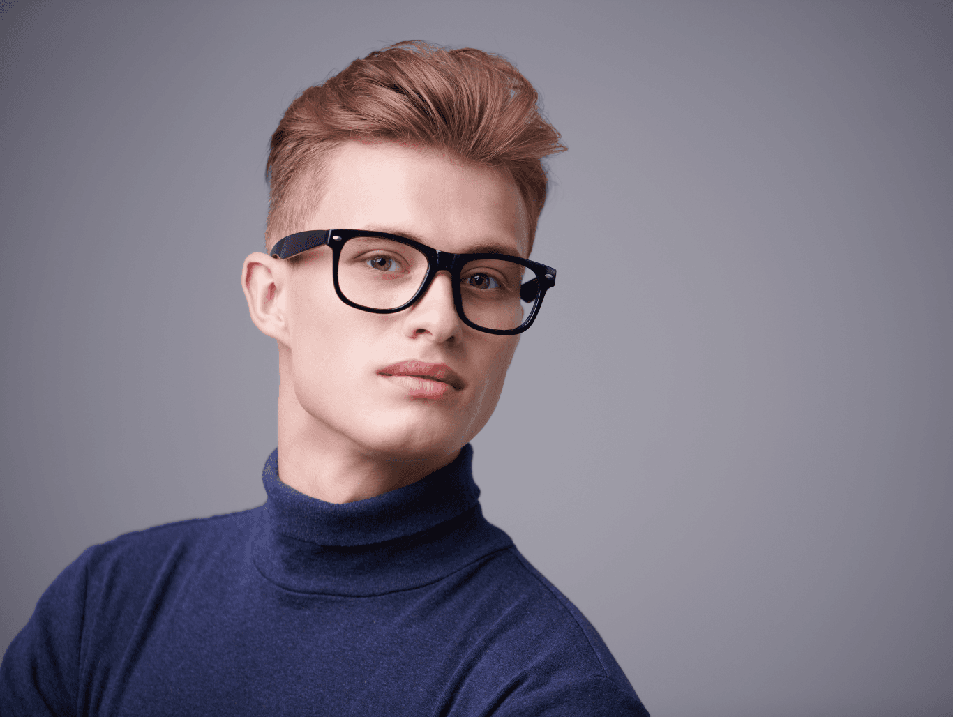 Man with a clean, modern haircut and styled finish following a professional shampoo and cut at Cruz Hairworks
