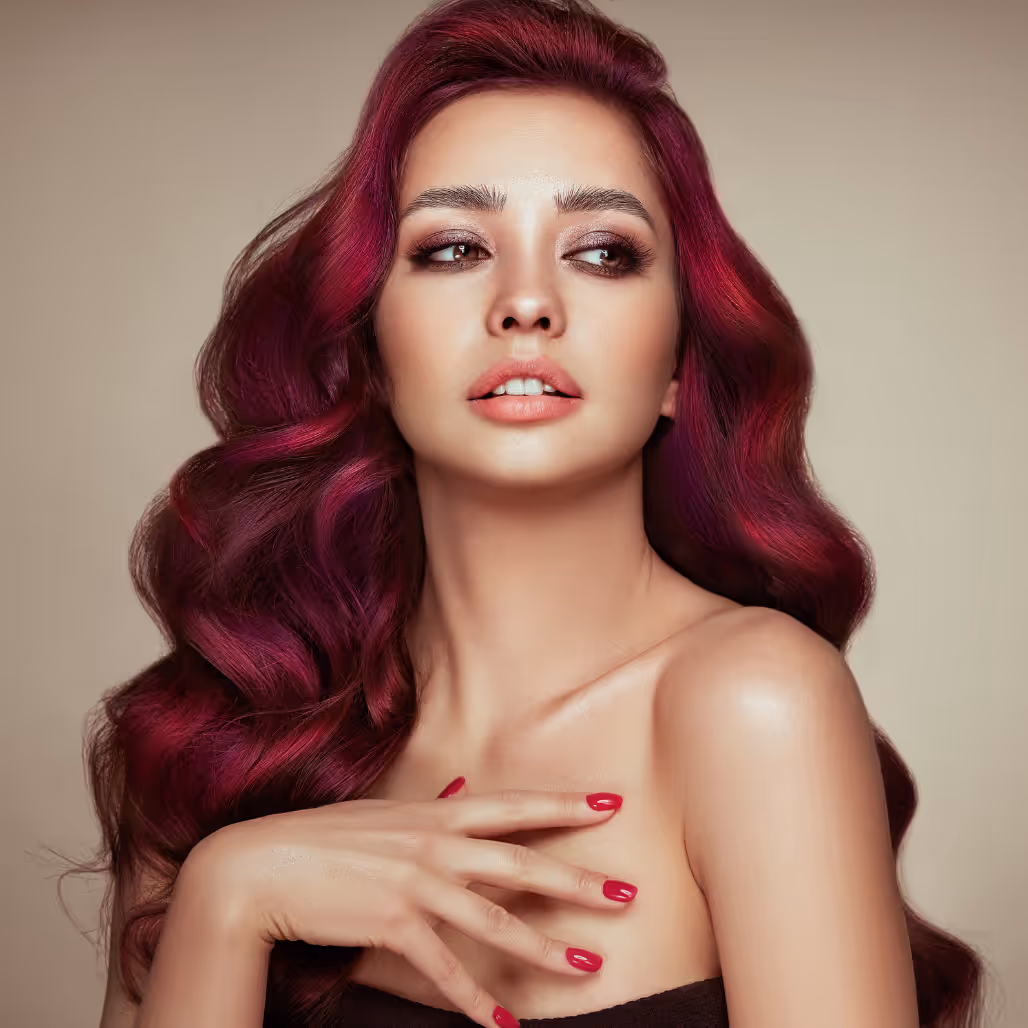 Model with multi-tonal blonde colour and soft waves – showcasing professional hair colouring at Cruz Hairworks in Whitley Bay.
